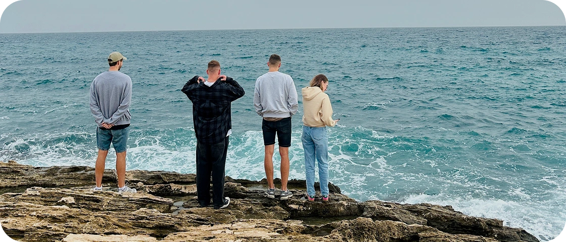 Team by the ocean